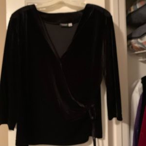 This black velvet cross body looks great on.